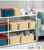 Supplier styling photo of several yellow and blue storage boxes on shelving; different sizes, toys and furniture shown